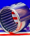 SCE1816 Needle Bearing 1-1/8" x 1-3/8" x 1" inch with metal shell and needle rollers on colorful background