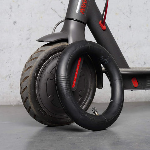 8.5 Inch Scooter Inner Tubes beside an electric scooter, compatible with Gotrax Gxl V2, M365, Pro 2, 1s, shown with tire and valve.