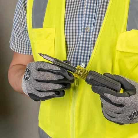 Person holding Replacement Bit For 11-In-1 And 10-In-1 Screwdriver Nut Drivers with #2 Phillips and 1/4 inch slotted tips.