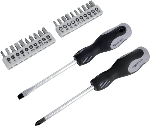 Close-up of screwdriver set with interchangeable bits from 65 Piece General Household Tool Kit Set With Carry Case Durable Steel Tools Ergonomic Non Slip Handles Handy For Everyday DIY Projects And Basic Home Repairs.