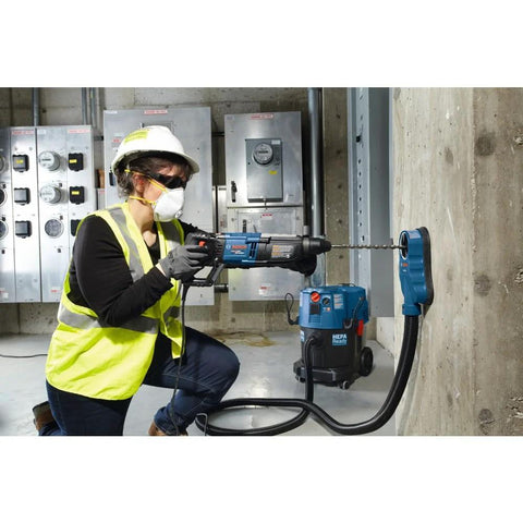 Person using One And One Eighth Inch SDS-Plus Bulldog Xtreme Max Rotary Hammer For Concrete Drilling And Chiseling In Masonry