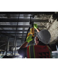 Worker using lightweight corded SDS rotary hammer with Active Vibration Control delivers 3.0 J impact energy and an 8.5 A motor