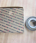 Heavy-Duty Industrial Bearing MB351-12-PA Rexnord MB35112PA Sealed Ball Bearing next to branded packaging box