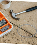 Sealing Machine Heating Wire Strip Replacement Heat Sealer Elements with tools on a workbench