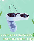 See Through Safety Goggles Pack Of 2 For Tanning And Eye Protection With Cases, shown with storage cases on a green background.