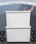 Image showing two stacked white storage boxes with 8 Pcs Self Adhesive Caster Wheels For Appliances And Small Furniture With 360 Degree Swivel Rotation Durable ABS And Stainless Steel Bearings Black Easy To Install On Most Surfaces Providing Smooth Glide For Heavy Trash Cans Bins And Storage Boxes visible around them.