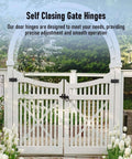 Heavy Duty Self Closing Gate Hinges For Vinyl And Wood Fences, installed on white fence gate with floral garden backdrop