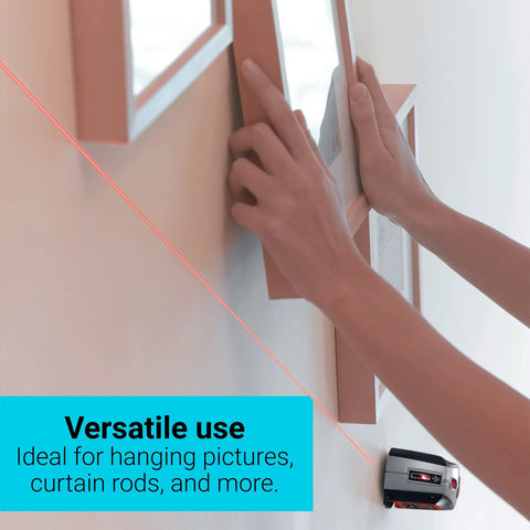 Effortlessly align pictures, shelves, and mirrors with this self-leveling 360-degree laser level and wall mount in use.