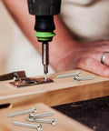 Person using a drill with 100 Pcs #6 x 1 Inch Pan Head Wood Screws Made from 304 Stainless Steel for wood installation.