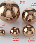 Five copper balls of varying sizes, including the highlighted 1.1 inches Copper Ball, reflecting a shiny surface for meditation energy use.