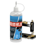 Sewing Machine Oil And High Temperature Lubricant For Precision Machines bottle beside a sewing machine