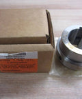 Heavy Duty Shaft Coupling 1.375 Inch Bore, 3 HSB, 5/16 ID, 5/32 OD, SS, Rexnord 7300265 with box on wooden table
