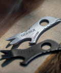 Shard 7 In 1 Keychain Multitool With Bottle Opener And Screwdriver, Lightweight Stainless Steel EDC Tool, close-up on wooden surface