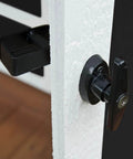 Shed door latch T handle lock kit with 4 keys, heavy duty metal hardware, black finish, side view on white wooden door