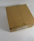 Brown cardboard box containing Acetal Flat Top Conveyor Chain D820K4-1/2G Rexnord, 1 1/2 In Pitch, 4 1/2 In Wide, 10 Ft Length.