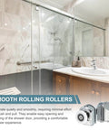 Bathroom with glass shower enclosure showing 25mm shower door rollers replacement set with single runners wheels and pulleys, silver finish.
