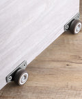 Mini Side Mount Casters 1.25 Inch With Mounting Screws For Furniture installed on wooden surface