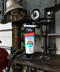 SIL-Glyde Multi-Purpose All-Weather Lubricating Compound for All Surfaces - 8 oz Tube on a workshop bench