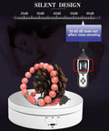 Motorized 360 Degree Rotating Display Stand for Jewelry and Collectibles showcasing bracelet with noise level meter