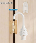 Christmas Tree Hanging Silicone Door Pinch Guard And Anti Door Slam Stopper Set installed on wooden door hinge