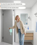 Woman closing bathroom door with Adjustable Silicone Door Silencer Sleeve Buffer With 5-Position Design in green installed on latch.