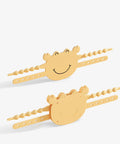 4 Pack Silicone Door Silencer Stopper Cushions For Quiet Closings Flexible Adjustable Snap Fits Most Doors Decorative Noise Reduction For Light Sleepers Cushioned Door Stopper To Prevent Slams And Keep Rooms Peaceful showing two yellow silicone stoppers with smiley face design.