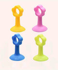 Colorful silicone door stopper bumper pad and wall protector for soft closing doors and cabinets reduces noise and impact.