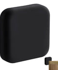 Protect walls and furniture from dents and scratches with a silicone door stopper wall protector; black square adhesive pad for noise reduction.