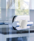 Soft silicone door wall protector cushions every swing to prevent scuffs, reduces door noise, installed on a glass door