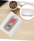 Clear 10 Piece Silicone Mold Covers For Handmade Jewelry And DIY Projects Dustproof Shield on table next to coffee beans