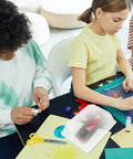 Children crafting with 10-Piece Pro-Grade Silicone Mold Protective Covers For Bracelets Dustproof And Waterproof Guards, on table