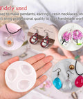 Hand holding Water Drop Pendant Silicone Molds for Resin Casting Jewelry Making 2 Pack With Hole, examples of completed resin jewelry shown.