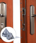 Ridiculously Quiet Rubber Door Silencer For Metal Frames Half Inch Diameter Hinge Stopper Anti Slam Device Reduces Door Slams And Noise Creates Peaceful Rooms Durable High Temperature Resistant Pack Of 100 shown installed on a wooden door with metal frame inset showing silencer detail.