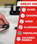 Hand applying clear silicone sealant on sink, showing great use on glass, ceramic, wood, aluminum, fiberglass, marble surfaces.