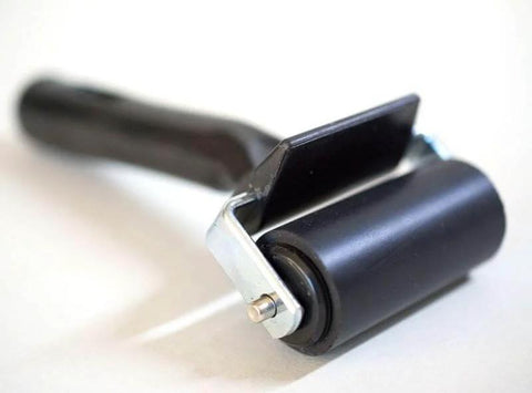 Silicone seam roller from Ultimate DIY Pro Grade Vinyl Repair Patch Kit for Commercial Inflatables, close-up view.