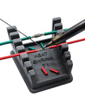 Upgraded Silicone Soldering Stand with Six Slot Wire Holder for 32AWG to 12AWG wires, shown with soldering iron and heat shrink reminder, dark grey.