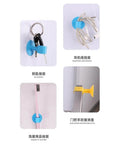 Orange Five Pack Silicone Doorknob Wall Mute Cushions used for key, cable, toothbrush hanging and door stopper.
