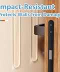 Clear Silicone Cabinet Door Bumpers, 10 Pack Self-Adhesive Noise Dampening Pads for Drawers and Furniture, Transparent Bumpers for Table Tops and Walls shown installed on wall behind door.