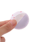Close-up of a pink silicone self-adhesive wall protector being peeled, part of a 5 Piece Silicone Self Adhesive Wall Protectors For Door Handles And Doorknobs Pink Cushioning Bumpers Buffer Guards And Silencers To Prevent Scratches Noise And Crashes In Home And Office set