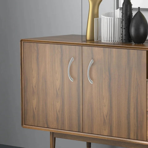 Silver Curved Drawer Handles Set Of 6 With Ergonomic Arch Design, 75mm Length And 65mm Hole Centers on wooden cabinet