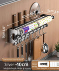 Silver 40CM+8Hook Modern Kitchen Utensil Hanger installed on wall, with knife rack, towel bar, and cookware hanging space-saving kitchen organizer.
