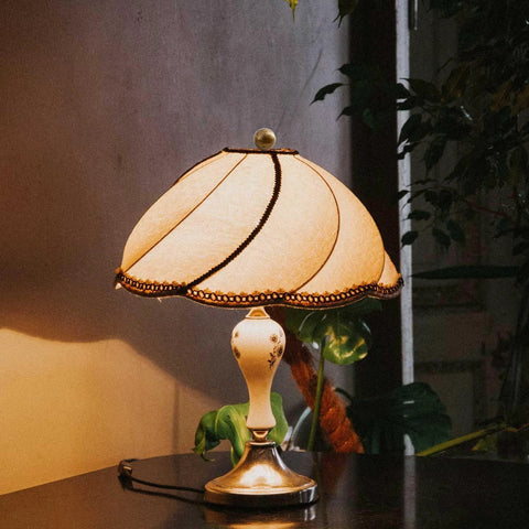 Vintage table lamp with a decorative shade, featuring 2 Pack 22mm Metal Ball Lamp Finials Caps And Knob With Classic Style Decorative Screw Cap Nuts.