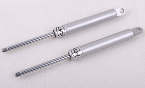 Close-up of two silver pneumatic arms for Cabinet Door Vertical Swing Lift Up Stay Pneumatic Arm Kitchen Mechanism Hinges (Silver)
