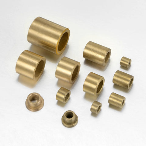12 Pack Flange Sleeve Bearings Self Lubricating Sintered Bronze Bushings arranged on white surface