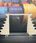 Six Layer Coil Wire Winding Device For Single Phase Motors With Beige Plastic Head Holder in front of colorful wire spools