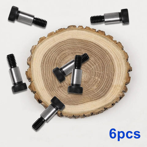 6pcs alloy steel shoulder bolts with 1/4 in shoulder dia, 1/2 in shoulder length, 10-24 UNC thread near wood slice