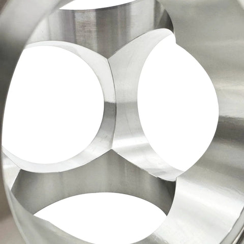 Close-up of Pro Grade Six Way Vacuum Chamber Flange Cube Flange in 304 stainless steel showing internal channels and connections.