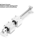 Four Pack SK6 Aluminum Linear Rail Clamping Supports for 6mm Shafts high precision guide rails setup viewed with a shaft installed.