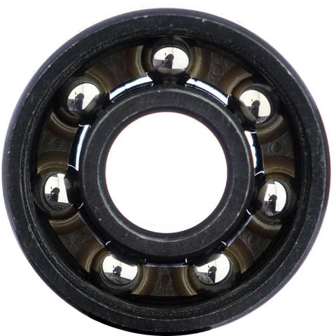 Close-up of a High Performance Skate Bearing with diamond polished raceways, USA-made, for smooth spins with Stackz Graphflo lubricant.