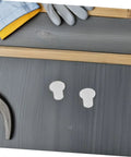 Two plastic side bushings from 50 Pack Inline Skate Edge Covers and Side Bushings for Roller Skates Universal Bearing Replacement Kit on a workbench.